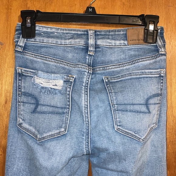 •AMERICAN EAGLE OUTFITTERS•LIGHT WASH NEXT LEVEL SUPER HI-RISE JEGGING SIZE 2 - Picture 5 of 7